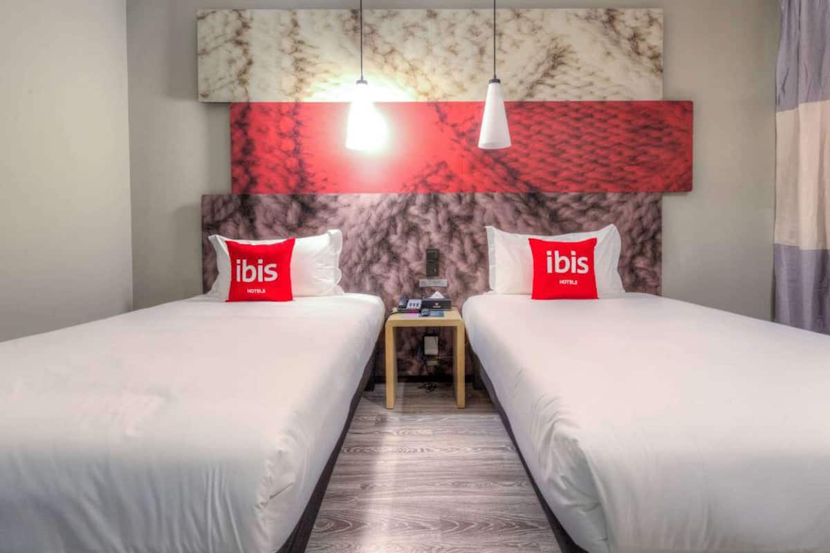 Premium bedding, pillow-top beds, free minibar items, desk