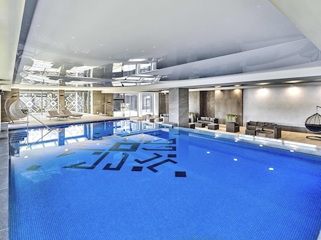 Indoor pool, open 7:00 AM to 10:00 PM, free cabanas, sun loungers