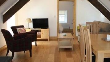 Apartemen, 1 kamar tidur | Area keluarga | TV layar datar