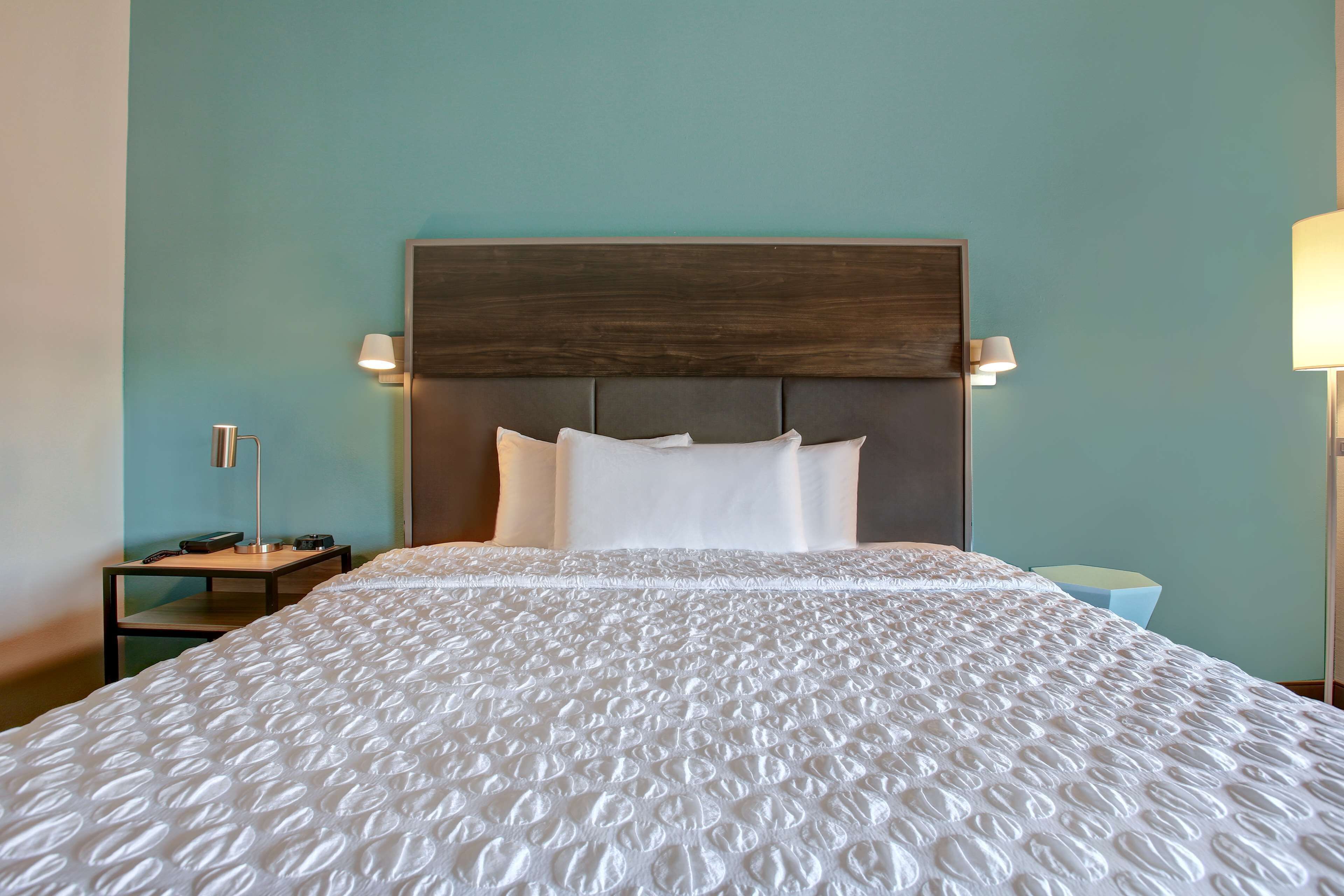 desk, laptop workspace, blackout curtains, iron/ironing board