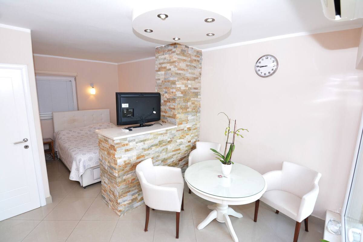 Basic Studio, Sea View | Living area | LCD TV