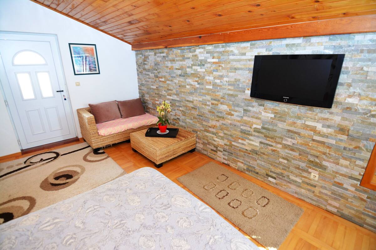 Classic Studio, Sea View | Living area | LCD TV