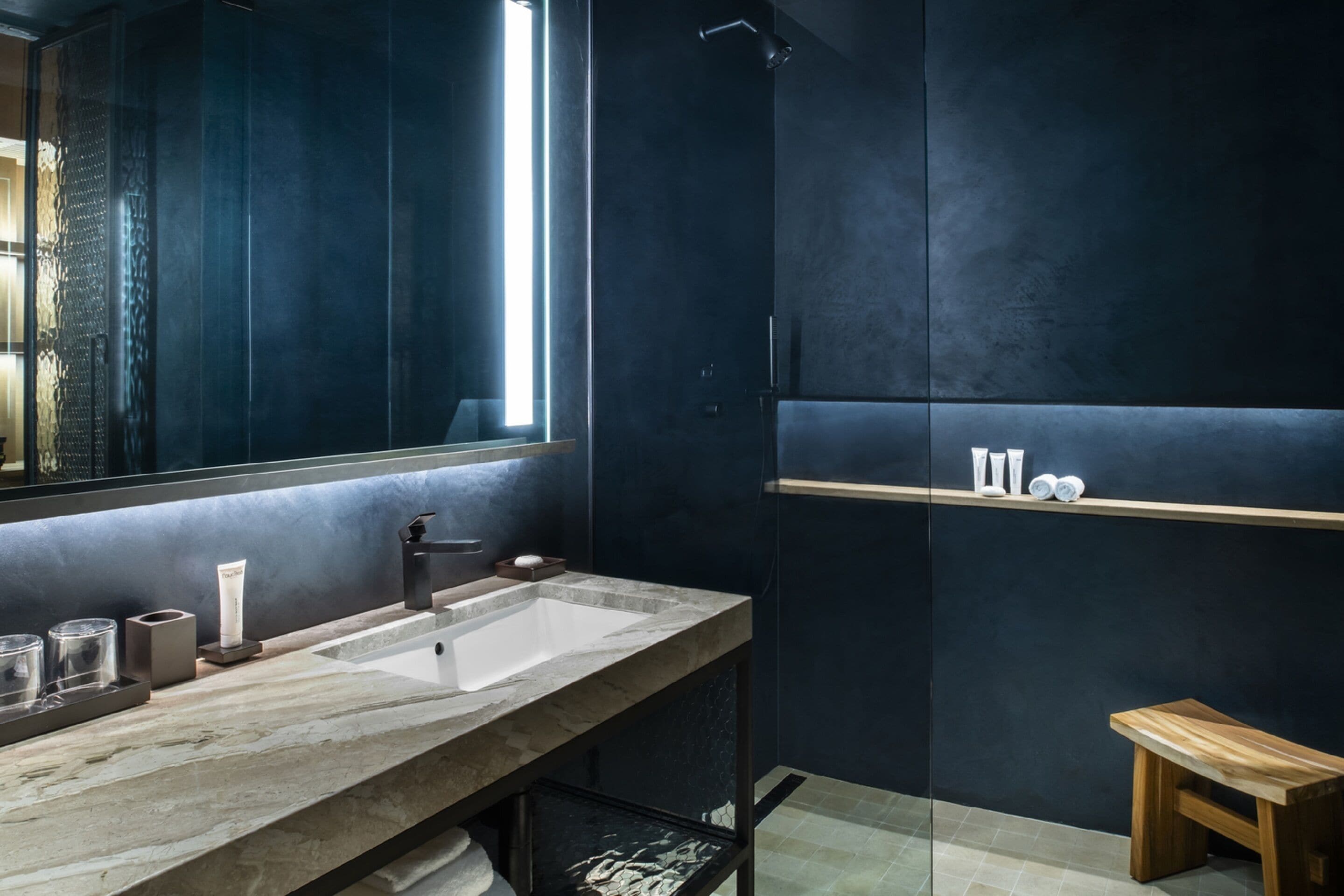 designer toiletries, hair dryer, bathrobes, towels