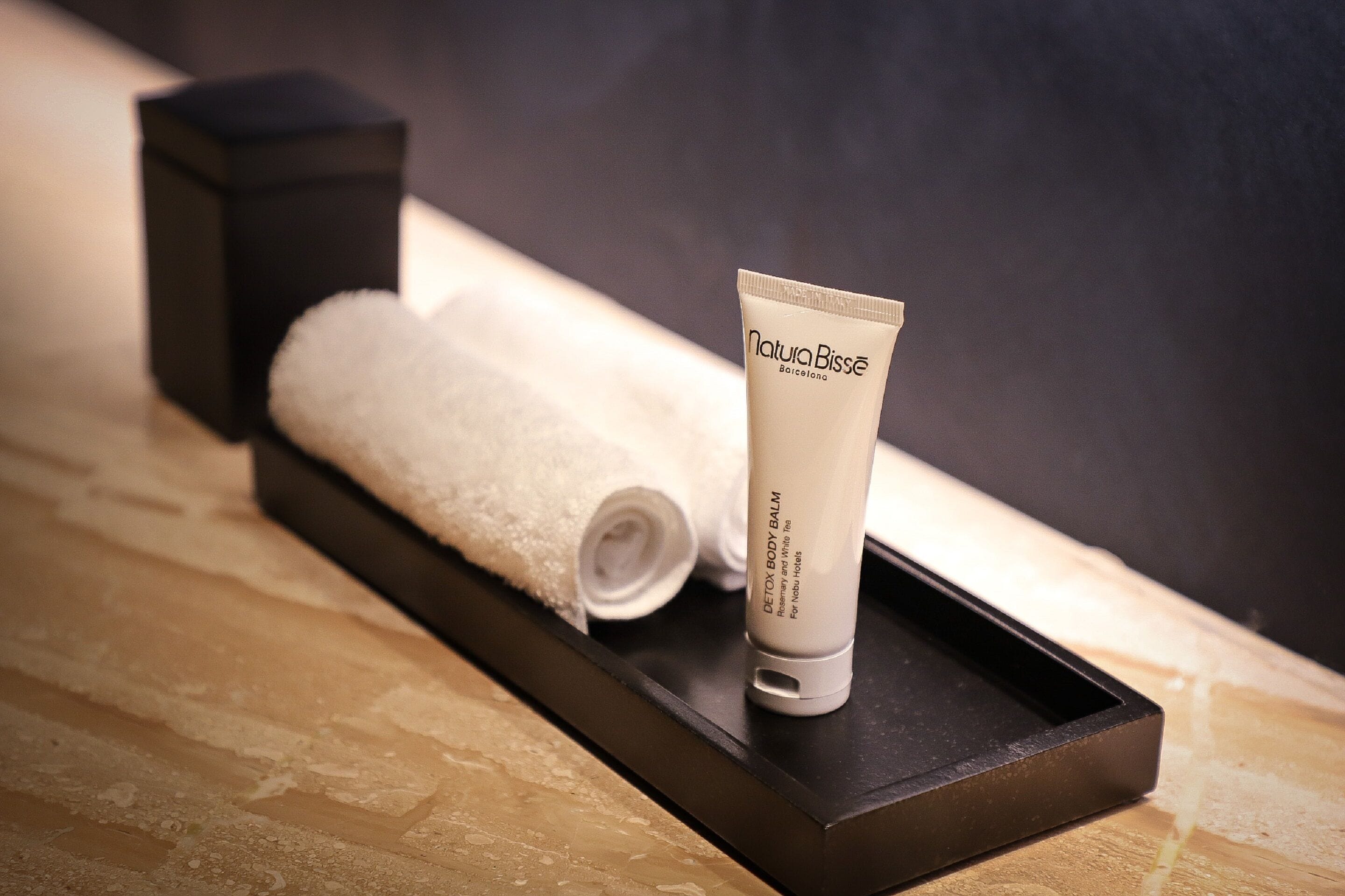 designer toiletries, hair dryer, bathrobes, towels