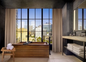 Designer toiletries, hair dryer, bathrobes, towels