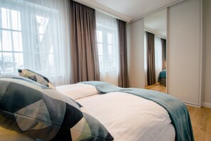 Apartament Deluxe | 1 dormitori, planxa i posts de planxar, wifi gratuïta i roba de llit