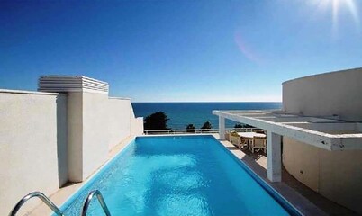 Beautiful penthouse with private rooftop pool right by the sea
