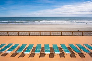 On the beach, sun loungers
