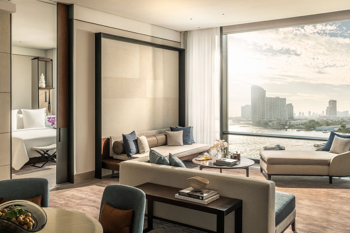 Four Seasons Executive Suite | Living area | 55-inch LCD TV with digital channels, TV, iPod dock