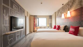 Premium bedding, memory foam beds, desk, laptop workspace