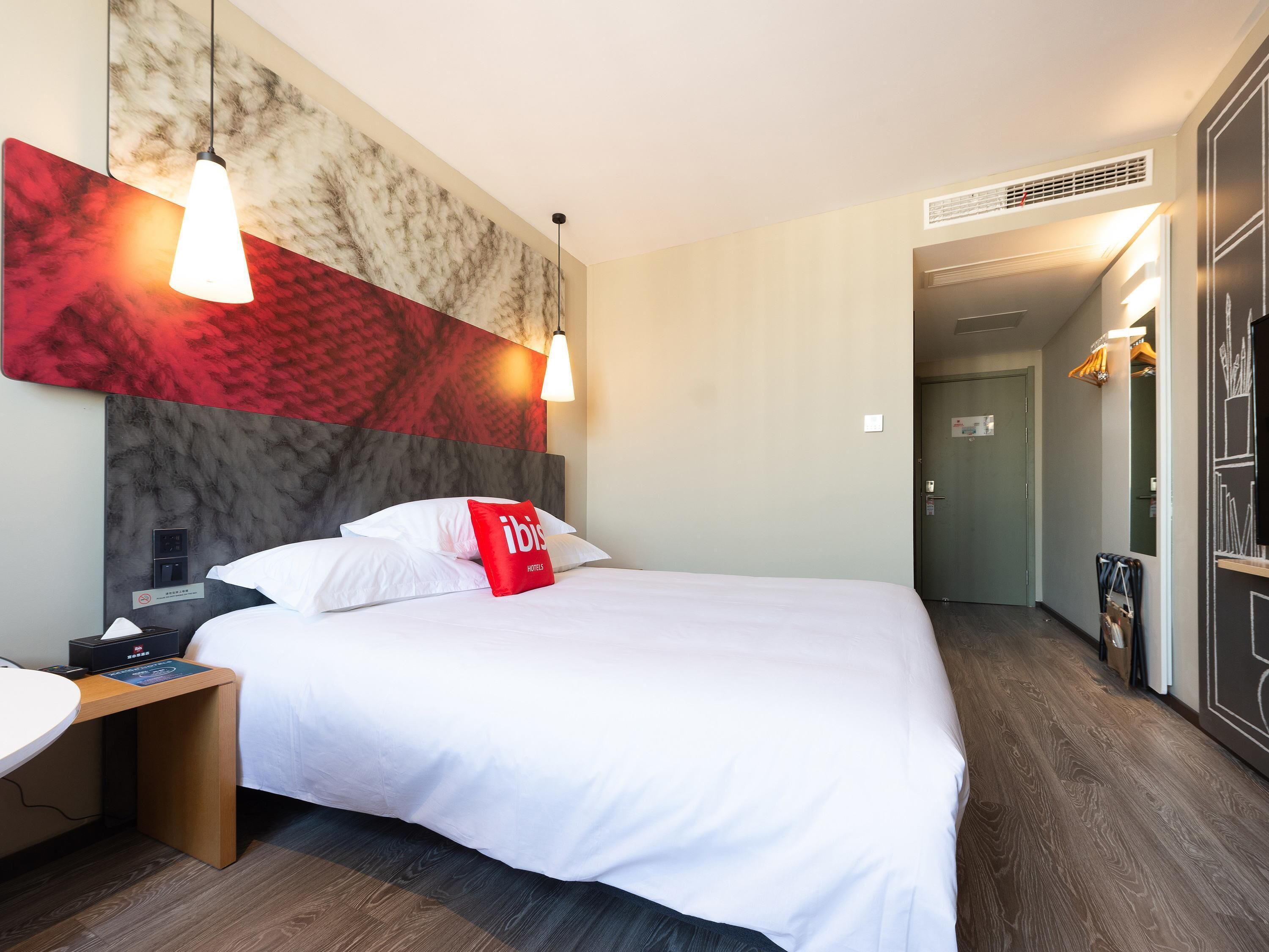 Desk, laptop workspace, blackout drapes, iron/ironing board