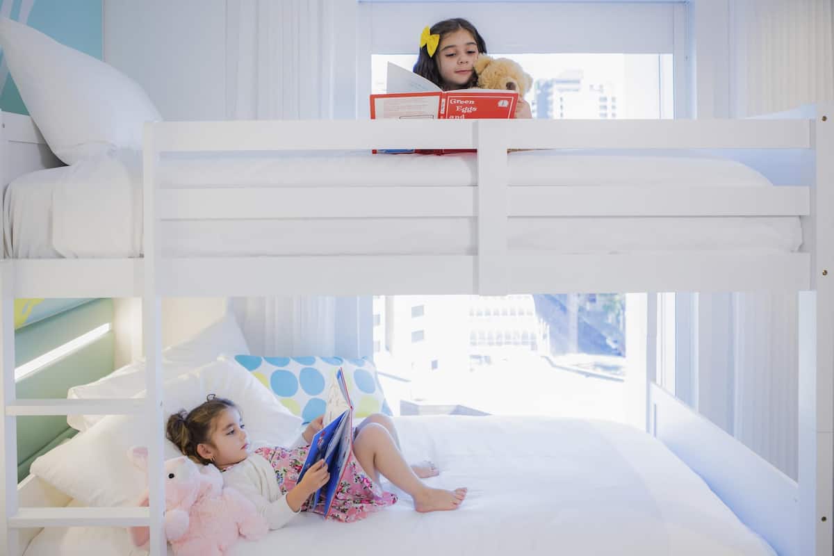 Family Room | Minibar, in-room safe, desk, blackout drapes