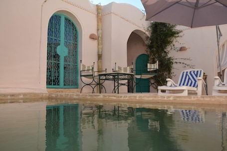 Pool. DAR LILY offers you an authentic experience hidden purely from Djerbien.