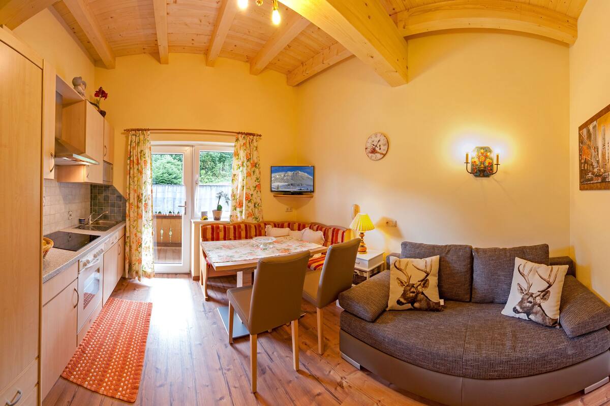 Exclusive Apartment, 2 Bedrooms, Tirol | Living area | 32-inch LCD TV with cable channels, TV