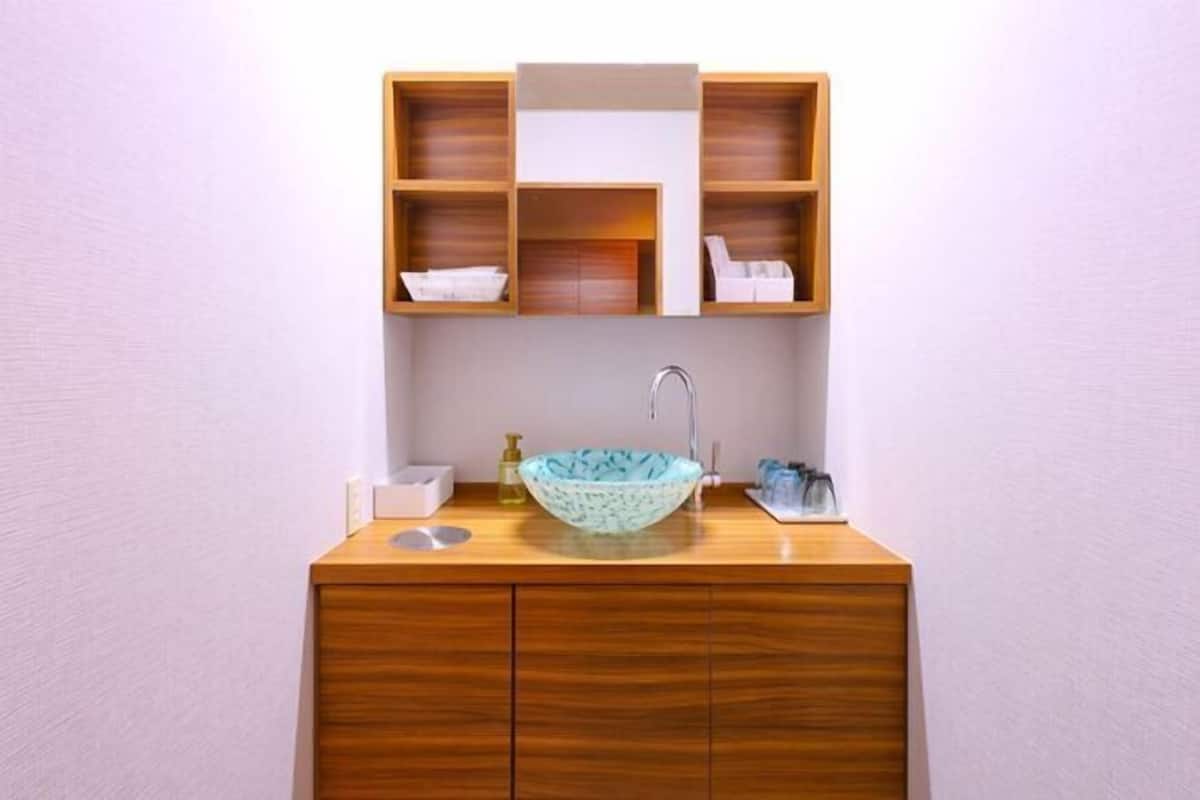 Bathroom | Slippers, electronic bidet, towels