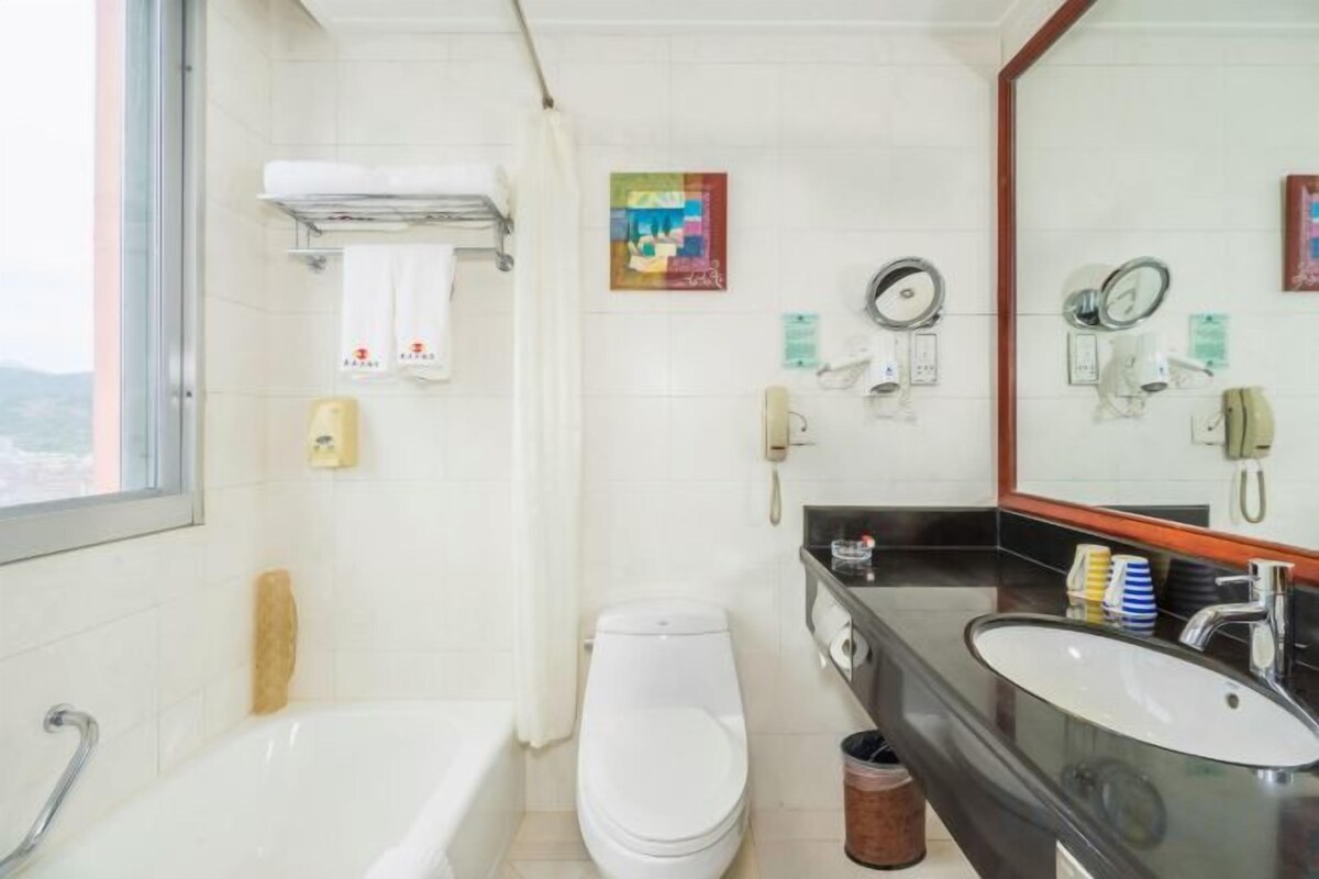 Bathroom | Shower, free toiletries, hair dryer, slippers