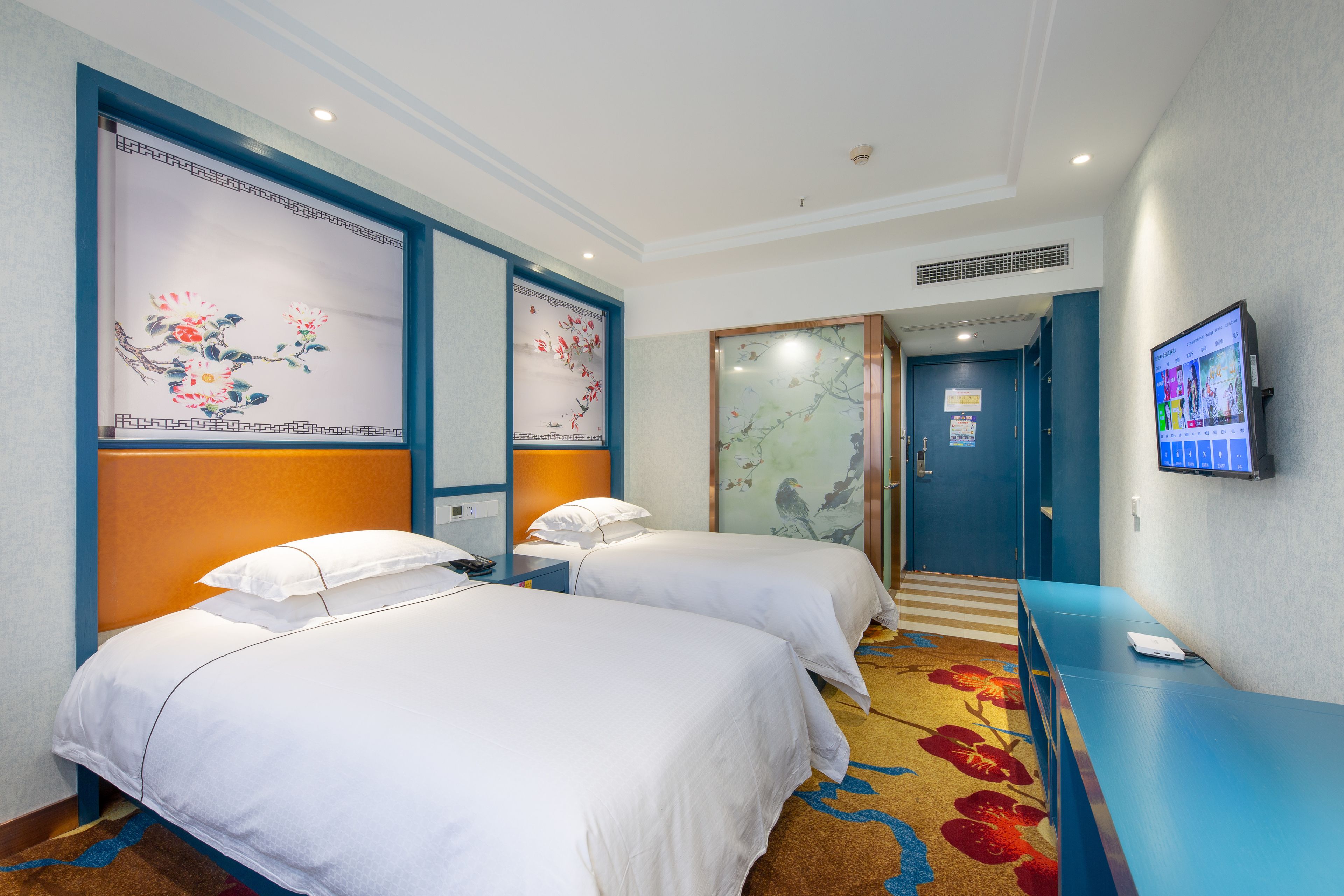 economy twin room | minibar, in-room safe, desk, blackout curtains