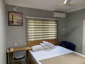 Executive Double Room | 1 bedroom, desk, laptop workspace, iron/ironing board