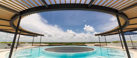 Outdoor pool, open 9:00 AM to 10:00 PM, pool umbrellas, sun loungers