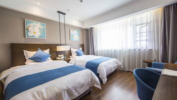 Economy Twin Room(Chinese Domestic Guests Only) | Blackout drapes, soundproofing, free WiFi, wheelchair access