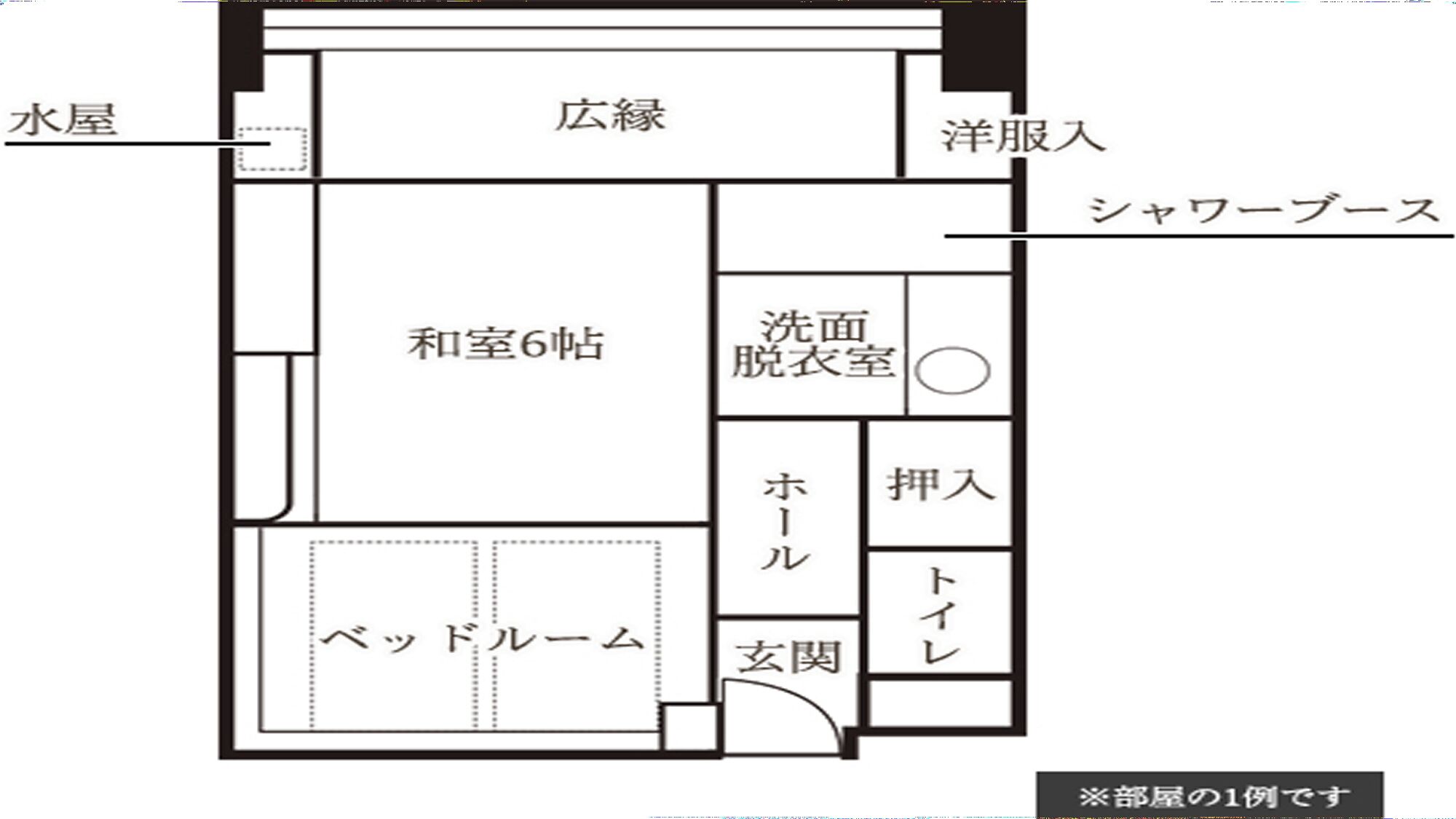 A hotel floor plan with a large central room, a bathroom, a shower room, a bed room, and a sitting area.