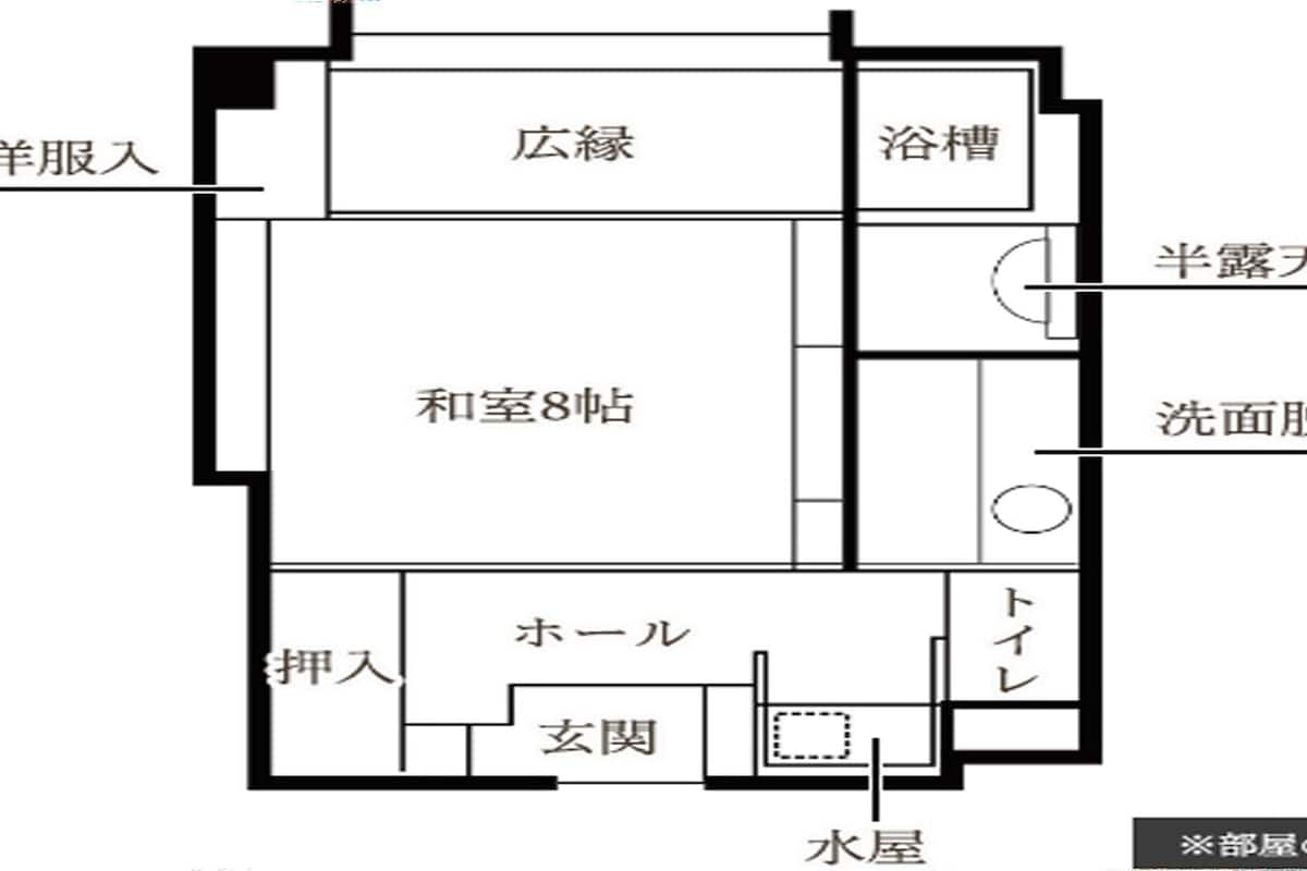 A floor plan with a living room, kitchen, bathroom, and two bedrooms.