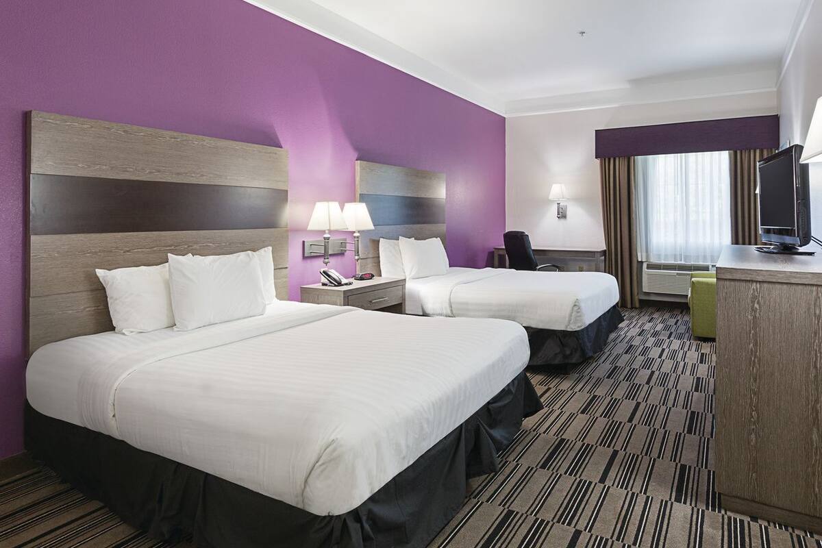 Deluxe Room, 2 Queen Beds | Pillowtop beds, desk, laptop workspace, blackout drapes
