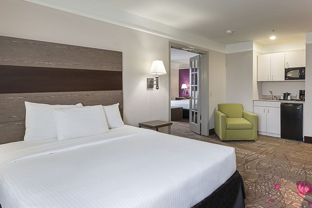 Family Suite, Multiple Beds | Pillowtop beds, desk, laptop workspace, blackout drapes