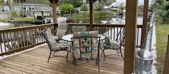 Waterfront, indoor pool, covered marina, fenced 3/2 home