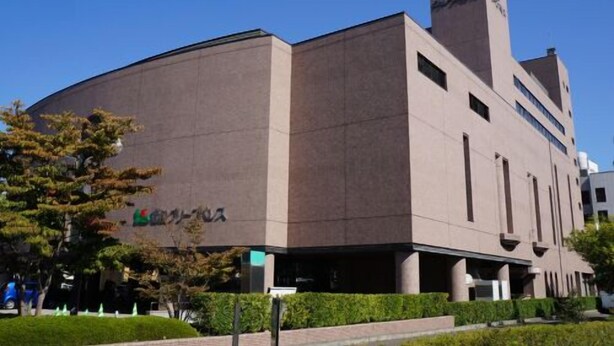 A modern building with a flat roof and a prominent tower. - Hotel Fukushima Green Palace (Fukushima)