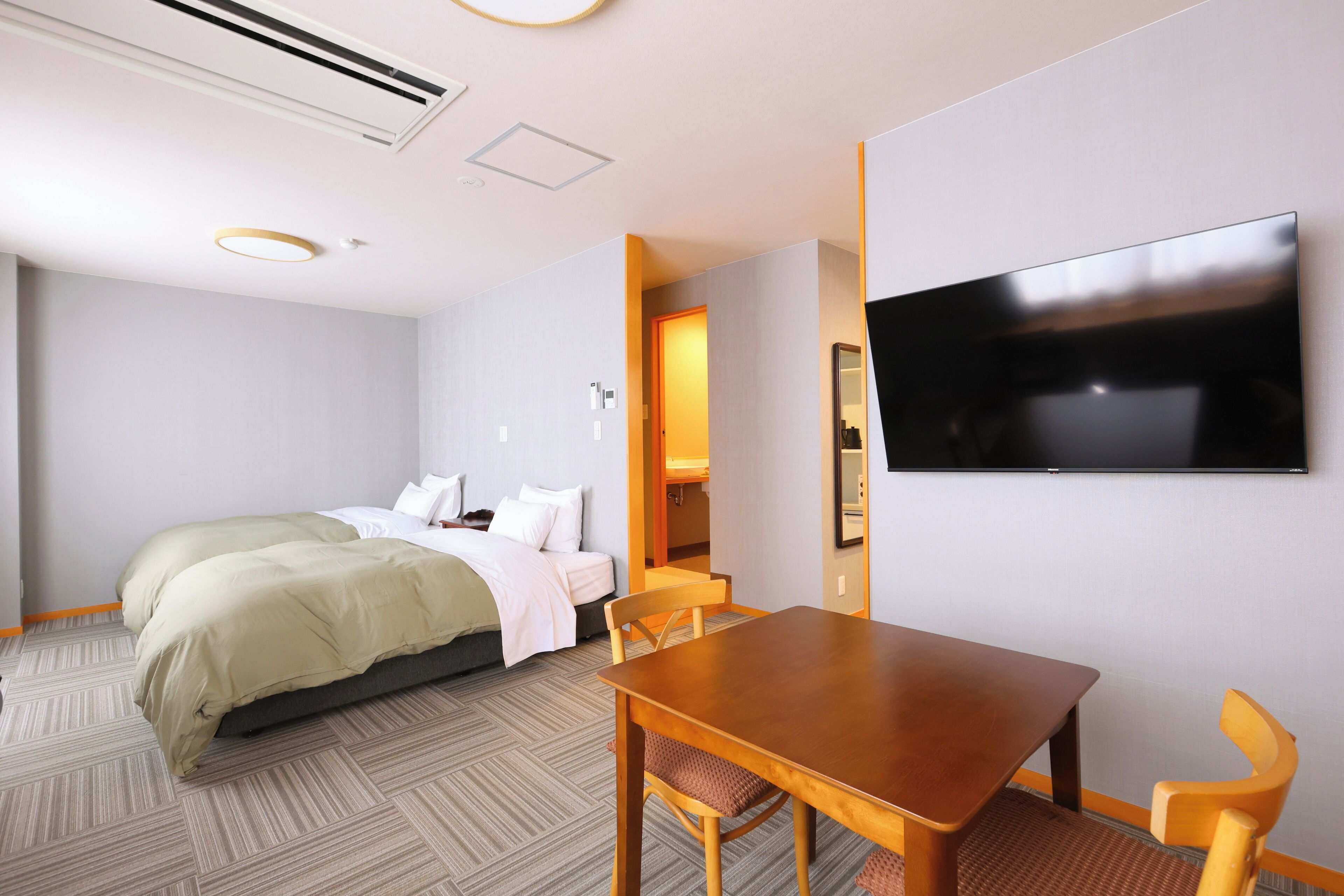 Deluxe Room | Down comforters, desk, laptop workspace, free WiFi