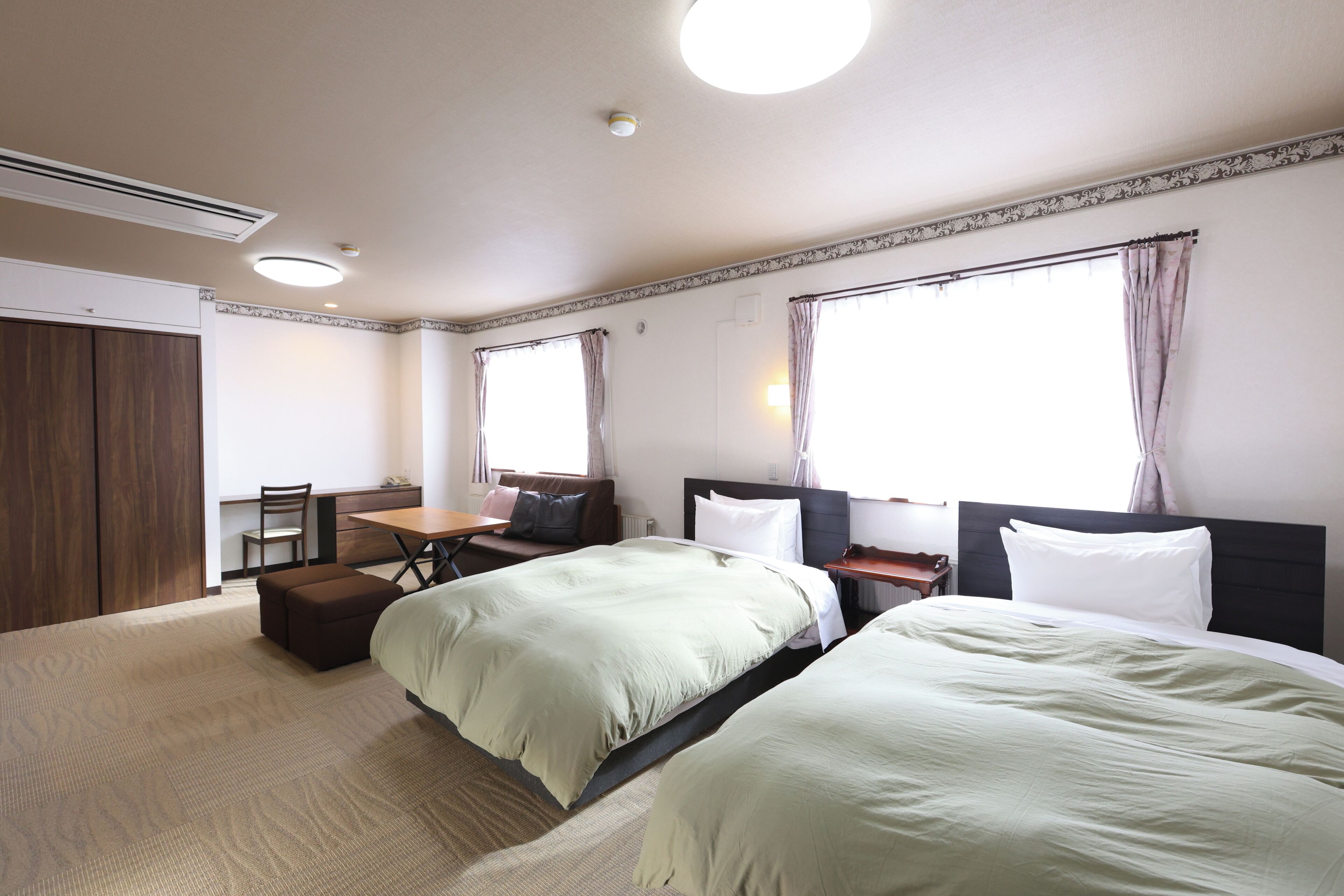 Deluxe Room, Non Smoking | Down comforters, desk, laptop workspace, free WiFi