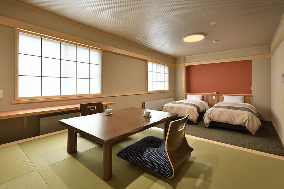 Deluxe kamer | Donzen dekbedden, een bureau, een laptopwerkplek, gratis wifi