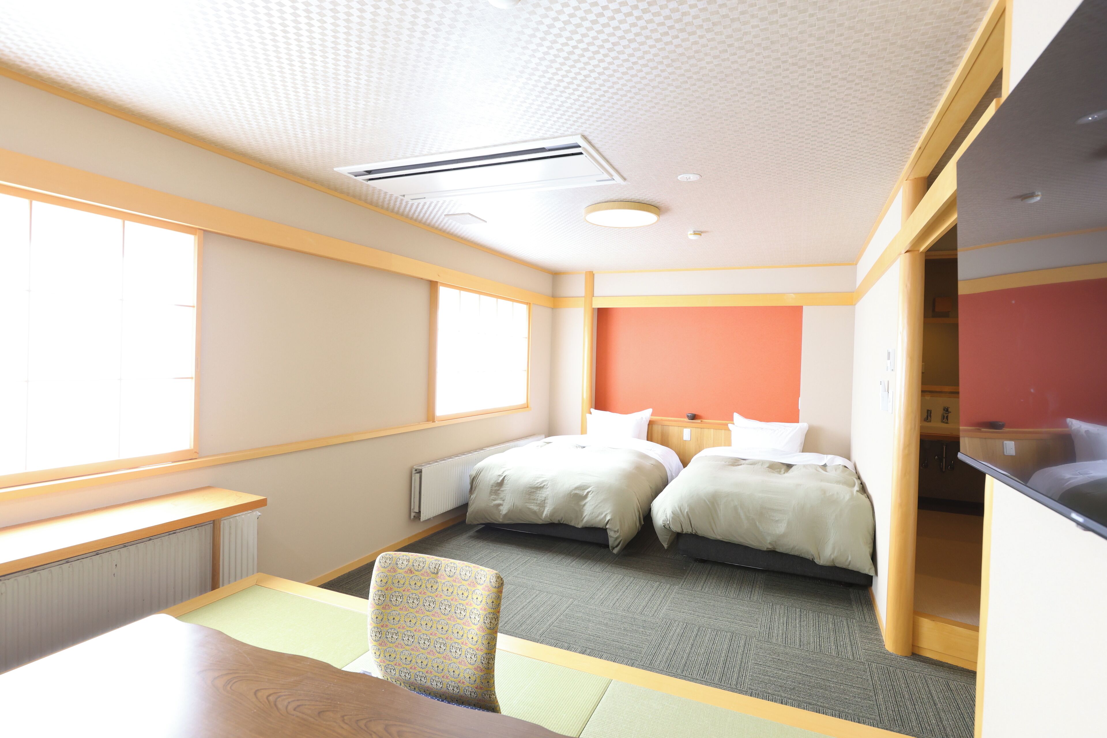 Deluxe Room | Down comforters, desk, laptop workspace, free WiFi