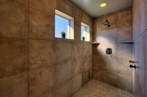 Combined shower/tub, hair dryer, towels, soap