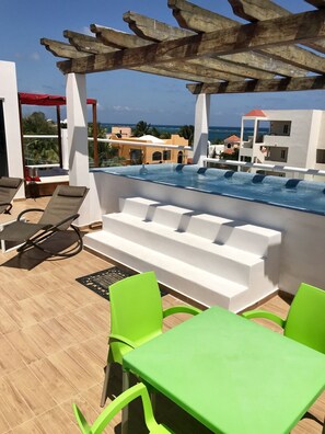 Deluxe Suite, Bay View | Premium bedding, in-room safe, individually decorated - Suites SanRey (Puerto Morelos)