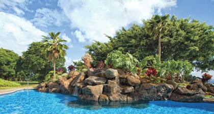 Genießen Sie dieses tropische Oceanside Resort nur 1,6 km vom Queens Bath Tide Pool entfernt