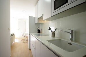 Fridge, microwave, coffee/tea maker, electric kettle