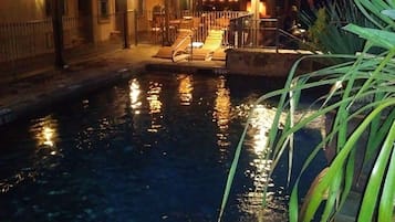 Outdoor pool, open 6:00 AM to 10:00 PM, pool loungers