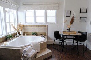 Deluxe Room, 1 King Bed (3) | Bathroom | Separate bathtub and shower, deep-soaking bathtub, rainfall showerhead - The Evers House (Fredericksburg)