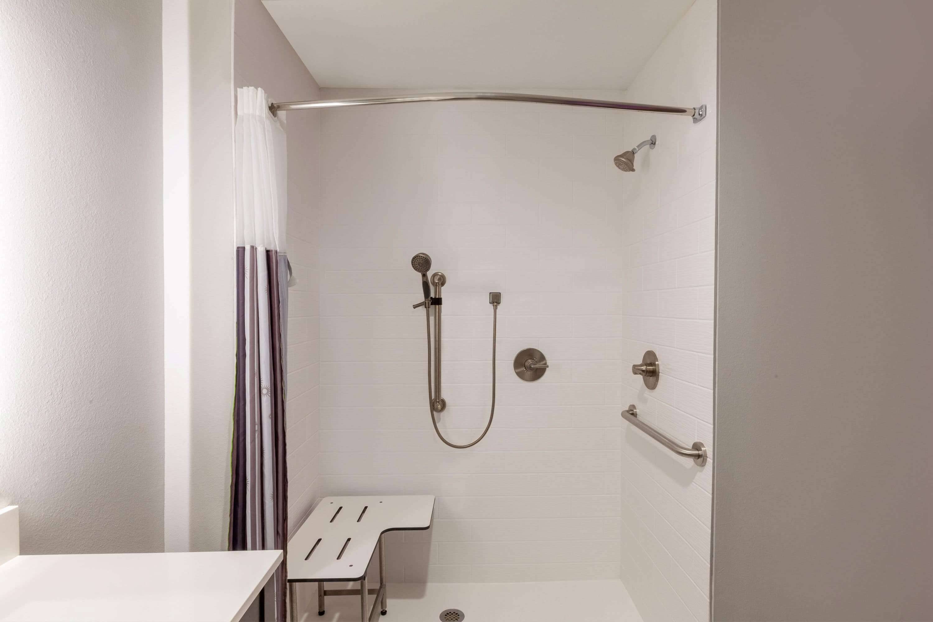 combined shower/bathtub, free toiletries, hair dryer, towels