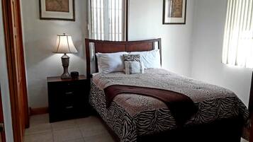 Family Condo, 2 Queen Beds, Courtyard View | 2 bedrooms, laptop workspace, iron/ironing board, free WiFi