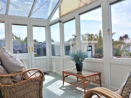 Two-Bedroom Apartment with Private Terrace - Ground Floor | Living area | 50-inch Smart TV with digital channels, fireplace, MP3 dock