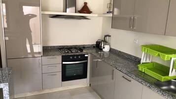 Villa, 3 Bedrooms, Garden View | Private kitchen | Fridge, oven, stovetop, coffee/tea maker