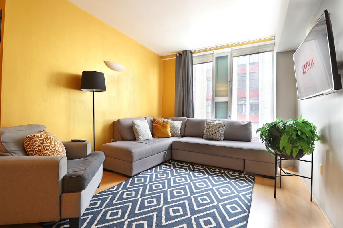 Apartamento família, 2 quartos | Área de estar | Smart TV, Netflix