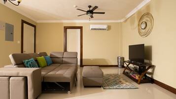 Luxury Apartment, Multiple Beds | Living room | Smart TV
