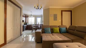 Luxury Apartment, Multiple Beds | Living room | Smart TV