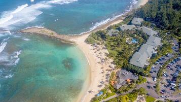 On the beach, sun loungers, beach towels