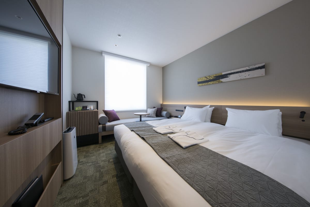 Economy Twin kamer, 2 eenpersoonsbedden, niet-roken | 1 slaapkamer, donzen dekbedden, een kluis op de kamer