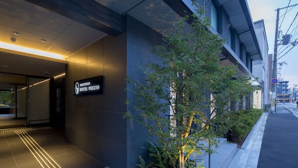 A modern hotel entrance with a sign reading "Hotel Prezio". - Shizutetsu Hotel Prezio Kyoto-Shijo (Kyoto)